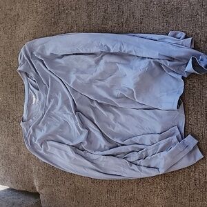 Long sleeve to wear over sports bra or tank, slit in back